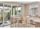Dining area with slider to backyard, plenty of natural light and breakfast bar at 2008 Makley Loop, Castle Rock, CO 80104