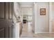 Inviting entryway showcasing wood floors, open floor plan, and modern decor at 2008 Makley Loop, Castle Rock, CO 80104