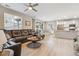Open concept living area seamlessly flows into the kitchen with stainless steel appliances at 2008 Makley Loop, Castle Rock, CO 80104