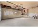 This unfinished garage offers plenty of potential, with an unfinished ceiling and concrete floor at 6699 S Pennsylvania St, Centennial, CO 80121