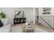 Bright living room with modern decor, neutral tones, stylish furniture, and lots of natural light at 6699 S Pennsylvania St, Centennial, CO 80121