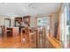 Charming dining room area with elegant chandelier and ample natural light, perfect for Gathering gatherings at 5555 Perth Ct, Denver, CO 80249