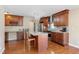 Well-appointed kitchen featuring granite countertops, stainless steel appliances, and custom cabinetry at 5555 Perth Ct, Denver, CO 80249