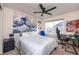 Bedroom with large wave tapestry and a workspace at 1682 Dorothy Cir, Longmont, CO 80503