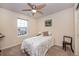 Cozy bedroom with window and ceiling fan at 1682 Dorothy Cir, Longmont, CO 80503