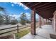 Brick patio with view of backyard and wooden fence at 4272 E Orchard Pl, Centennial, CO 80121