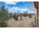 Open green space and trees in backyard at 4272 E Orchard Pl, Centennial, CO 80121