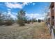 Spacious backyard with trees and open space at 4272 E Orchard Pl, Centennial, CO 80121