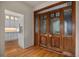 View of kitchen and hardwood floors from entryway at 4272 E Orchard Pl, Centennial, CO 80121