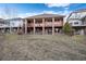 Brick house with large deck and open space at 4272 E Orchard Pl, Centennial, CO 80121