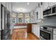 Kitchen with bay window breakfast nook and hardwood floors at 4272 E Orchard Pl, Centennial, CO 80121