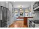 Kitchen with bay window breakfast nook and hardwood floors at 4272 E Orchard Pl, Centennial, CO 80121