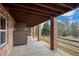 Covered brick patio with storage shed at 4272 E Orchard Pl, Centennial, CO 80121