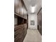 Large walk-in closet with custom built-ins and mirror at 4272 E Orchard Pl, Centennial, CO 80121