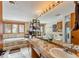 Spacious bathroom offers double sinks, large mirror, soaking tub with stunning views of the snow covered forest at 290 Broken Lance Dr # B202, Breckenridge, CO 80424