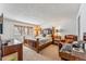 Comfortable bedroom with wooden bed, desk and chair, plus a stunning view of the snow covered forest at 290 Broken Lance Dr # B202, Breckenridge, CO 80424