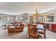 Combination living and dining area with comfortable seating and natural light at 290 Broken Lance Dr # B202, Breckenridge, CO 80424