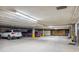 Well-lit parking garage with assigned parking spots for residents at 290 Broken Lance Dr # B202, Breckenridge, CO 80424