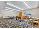Recreation room offering a ping pong table, foosball table, and television at 290 Broken Lance Dr # B202, Breckenridge, CO 80424