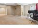 Spacious finished basement with carpet and an office at 4901 Ashbrook Cir, Highlands Ranch, CO 80130