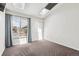 Bedroom with skylight and closet boasts abundant natural light and practical storage solutions at 10309 W Fair Ave # E, Littleton, CO 80127