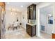 Dining area with white table, pendant lights and cabinet with glass doors at 3429 W 34Th Ave, Denver, CO 80211