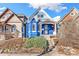 Inviting home exterior featuring blue siding and a well-maintained yard; a great example of curb appeal at 3429 W 34Th Ave, Denver, CO 80211