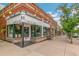 Storefront exterior featuring red brick and large windows at 3429 W 34Th Ave, Denver, CO 80211