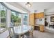 Bright breakfast nook with backyard views, built-in desk, and ample natural light at 6726 W 97Th Cir, Westminster, CO 80021