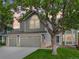 Charming gray two-story home with a well-manicured lawn and a three-car garage at 6726 W 97Th Cir, Westminster, CO 80021
