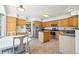 Open kitchen featuring ample cabinets, stainless steel appliances, and a casual dining area at 6726 W 97Th Cir, Westminster, CO 80021