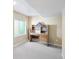 Home office with a built-in desk, neutral colored walls and good natural light at 6726 W 97Th Cir, Westminster, CO 80021
