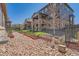 Well-maintained backyard featuring landscaping and neighboring homes in a desirable community at 7693 S Quantock Way, Aurora, CO 80016