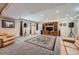 Spacious basement with neutral paint, recessed lighting, carpet, and large area rug at 7693 S Quantock Way, Aurora, CO 80016