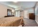 Bedroom with carpet, neutral paint, recessed lights, a dresser, and natural light at 7693 S Quantock Way, Aurora, CO 80016