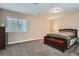 Bedroom features plush carpet, neutral walls, and a large window for plenty of natural light at 7693 S Quantock Way, Aurora, CO 80016