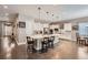 Spacious eat-in kitchen with a large island and stainless steel appliances at 7693 S Quantock Way, Aurora, CO 80016