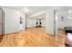 Open basement area with wood-look floors provides space for workout equipment and storage at 6545 Union St, Arvada, CO 80004
