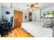 Comfortable bedroom features hardwood floors, ample space, and a computer desk area at 6545 Union St, Arvada, CO 80004