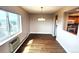 Cozy dining area with wood floors, natural light, and convenient access to the adjacent kitchen and living spaces at 13890 E Marina Dr # 602, Aurora, CO 80014