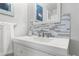 Stylish vanity features modern fixtures and designer backsplash at 2518 N State Highway 67, Sedalia, CO 80135