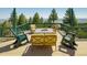 Inviting outdoor seating area with a fire pit and comfortable chairs, perfect for enjoying scenic views at 2518 N State Highway 67, Sedalia, CO 80135