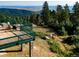 Inviting outdoor deck with comfortable seating, perfect for enjoying scenic views and outdoor gatherings at 2518 N State Highway 67, Sedalia, CO 80135