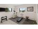 Home gym features an exercise bike, weight set, and great mountain views at 2518 N State Highway 67, Sedalia, CO 80135