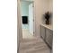 Linen closet and bathroom with a door leading into it at 665 W Burgundy St # A, Highlands Ranch, CO 80129