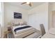 Bedroom with queen-size bed and sliding door to closet at 665 W Burgundy St # A, Highlands Ranch, CO 80129