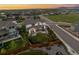 Aerial view of a beautiful home with a large backyard, landscaping, and a Gathering-friendly neighborhood at 6696 Kenzie Cir, Castle Pines, CO 80108