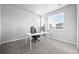 A modern office featuring a desk, chair, and natural light at 6696 Kenzie Cir, Castle Pines, CO 80108