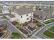 Aerial view of a charming suburban house with a landscaped backyard and wooden deck at 5842 High Timber Cir, Castle Rock, CO 80104