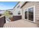 Backyard deck featuring wood flooring and access to the house via sliding glass door at 5842 High Timber Cir, Castle Rock, CO 80104